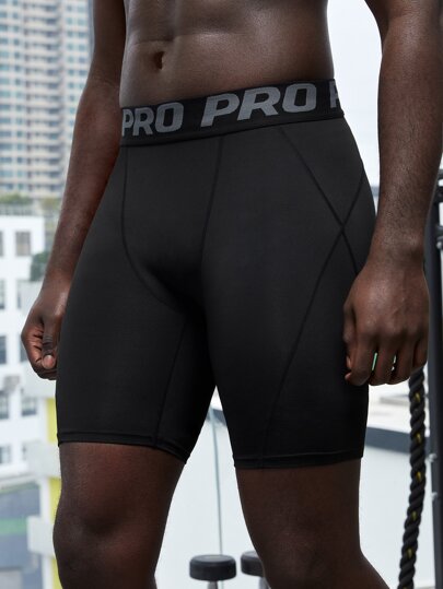 GymBeat Boyfriend Style Men Letter Tape Waist Sports Tights Legging Shorts, Black Compression Shorts, Lightweight, Gym