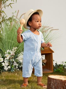Baby Jumpsuit mit Knopf vorne, Absteppen