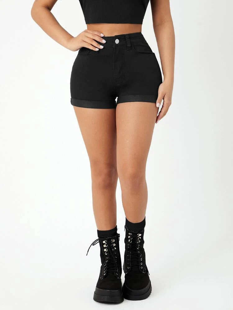 Shorts en mezclilla de talle alto bajo de doblez