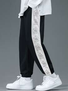 Manfinity Men Letter & Cartoon Graphic Contrast Side Seam Sweatpants - Black - View 1