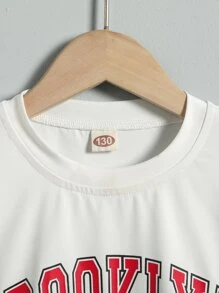 SHEIN Niñas Camiseta de hombros caídos con estampado de letra