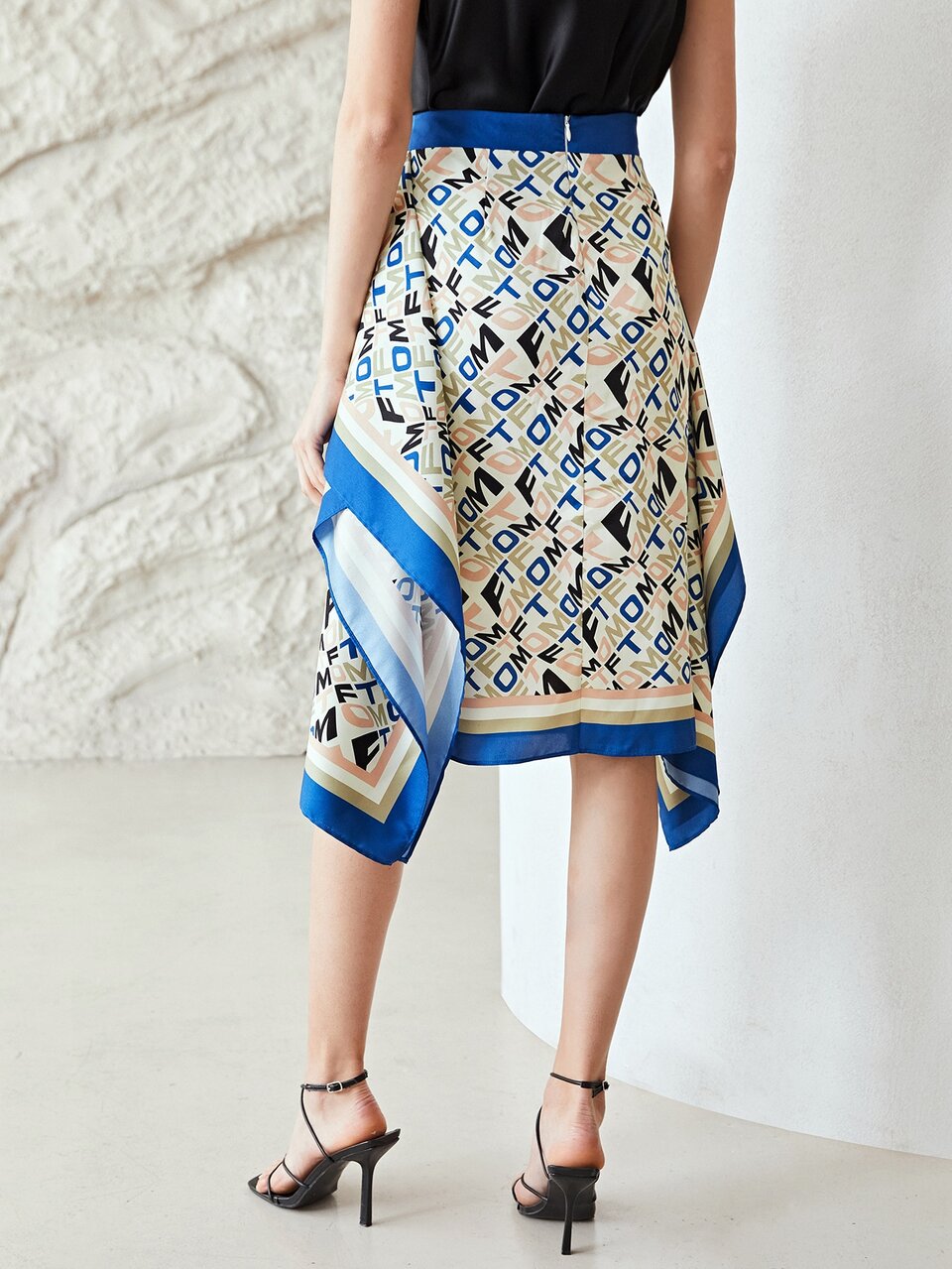 KNEE LENGTH ASYMMETRICAL SKIRT