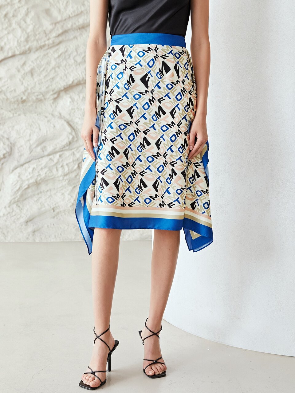 KNEE LENGTH ASYMMETRICAL SKIRT