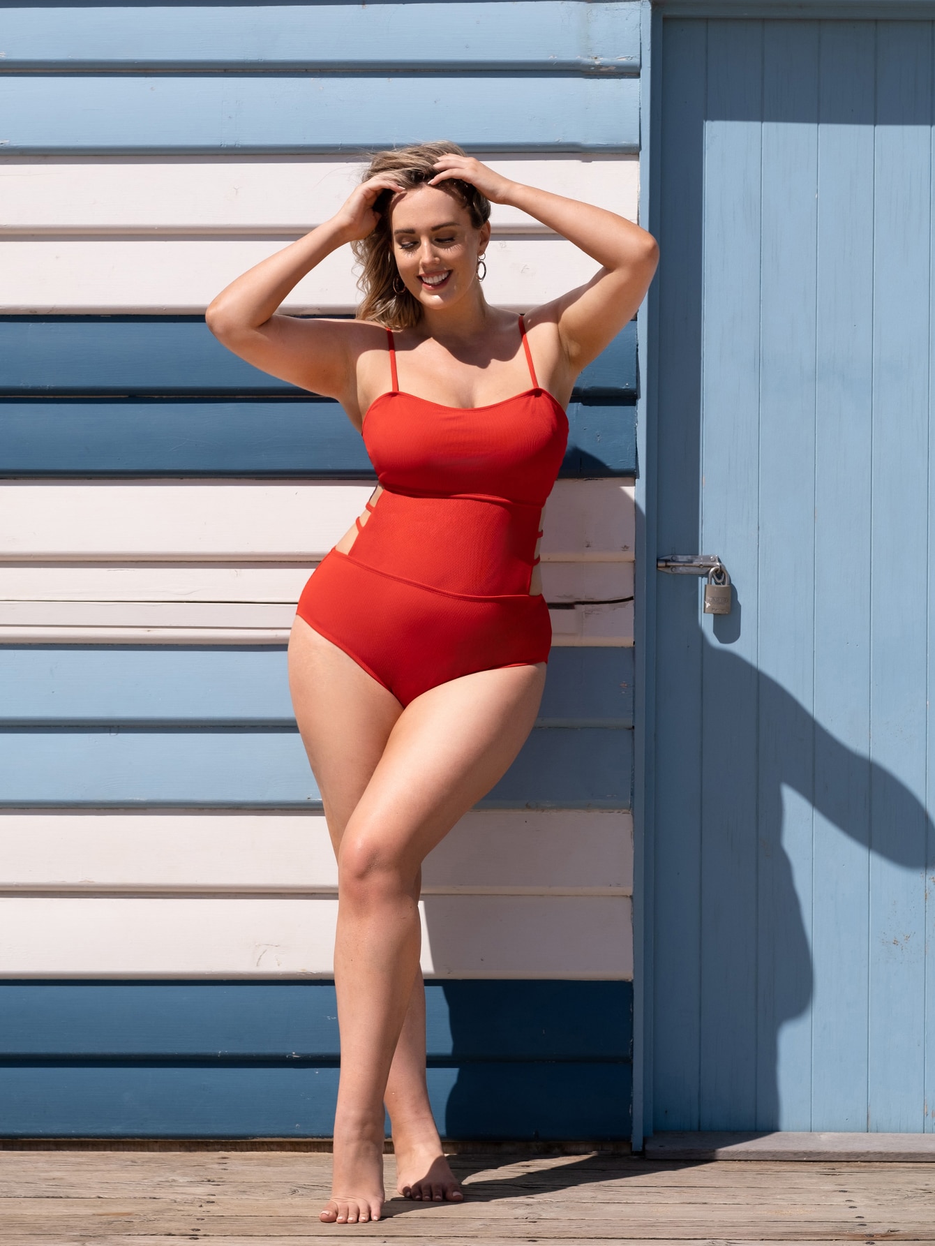 Our Plus Solid Ladder Cut-out One Piece Swimsuit is such a