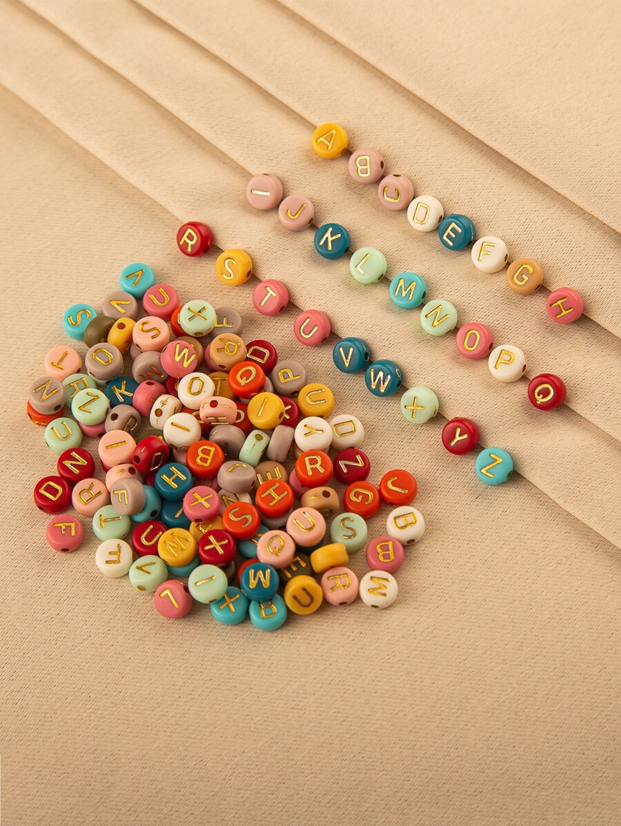 خرز لون عشوائي بتفاصيل حروف - 200 قطعة - متعدد الألوان - مشاهدة 1