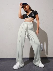 Quần thể thao nữ Dây kéo Túi Chia Lá thư - Màu Xám nhạt - Xem 4