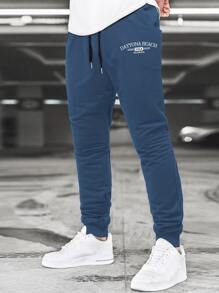 Manfinity Homme Quần thể thao Nam Dây kéo Lá thư - Màu xanh hải quân - Xem 1