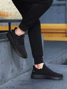 Hombres Zapatos de atletismo tejido de canalé - Negro - Ver 1