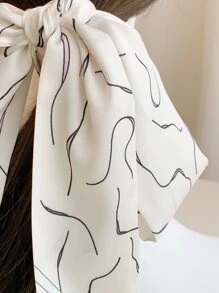 Diadema con estampado abstracto para la vuelta al cole