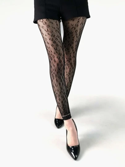 1条女士豹纹印花七分渔网紧身裤