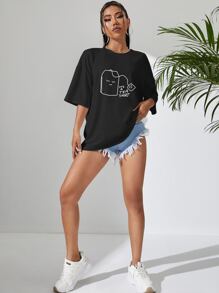 INAWLY Camiseta oversize con caída de hombro con gráfico de dibujos animados y eslogan "ES UNA CAMISETA DE TÉ", unisex