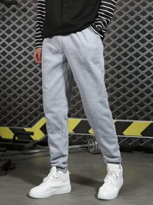 Manfinity Hypemode Men Solid Slant Pocket Joggers - Light Grey - View 1