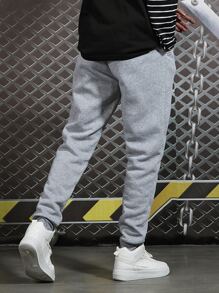 Manfinity Hypemode Men Solid Slant Pocket Joggers - Light Grey - View 2