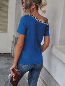 Áo thun nữ Bất đối xứng Báo Giải trí - Màu xanh lam - Xem 2