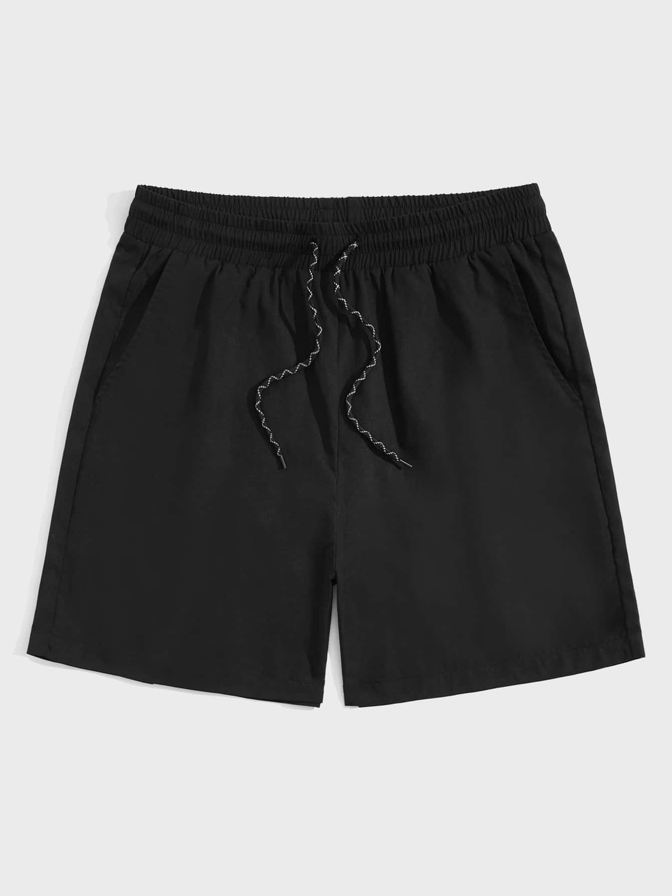 Manfinity NiteLyfe Shorts holgados para hombre con bolsillos en diagonal y cordón en la cintura - Negro - Ver 1
