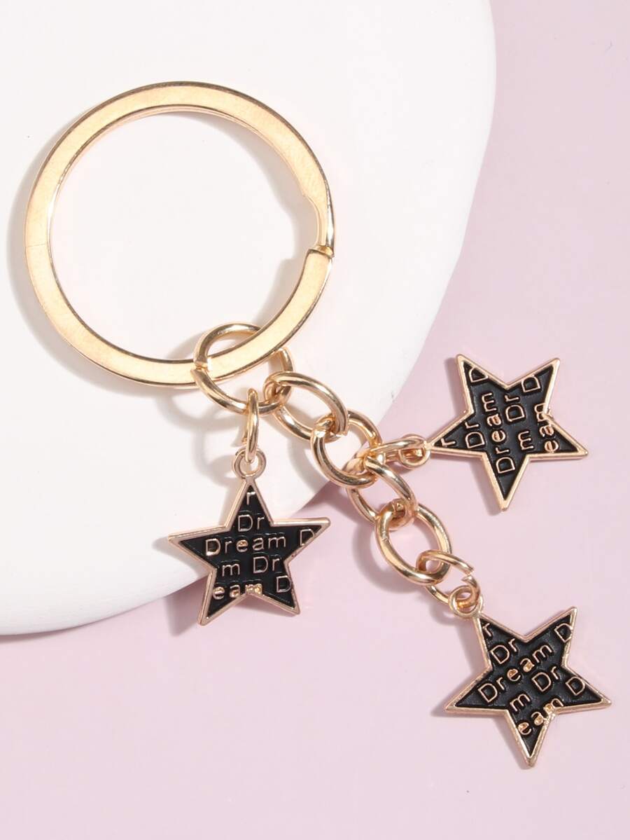 Llavero con diseño de letra con diseño de estrella - Negro - Ver 1