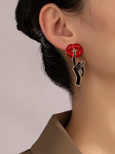 Boucles d'oreilles à design lèvres et geste
