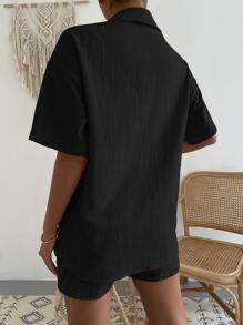 Shorts con blusa unicolor con parche de bolsillo de hombros caídos - Negro - Ver 2