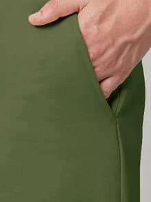 Manfinity Men Solid Slant Pocket Shorts - Green - View 3