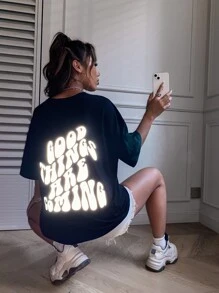 SHEIN Unity Reflective Slogan Graphic Drop Shoulder Tee GOOD THINGS ARE COMING Graphic Tees Women Tops - Black - View 1