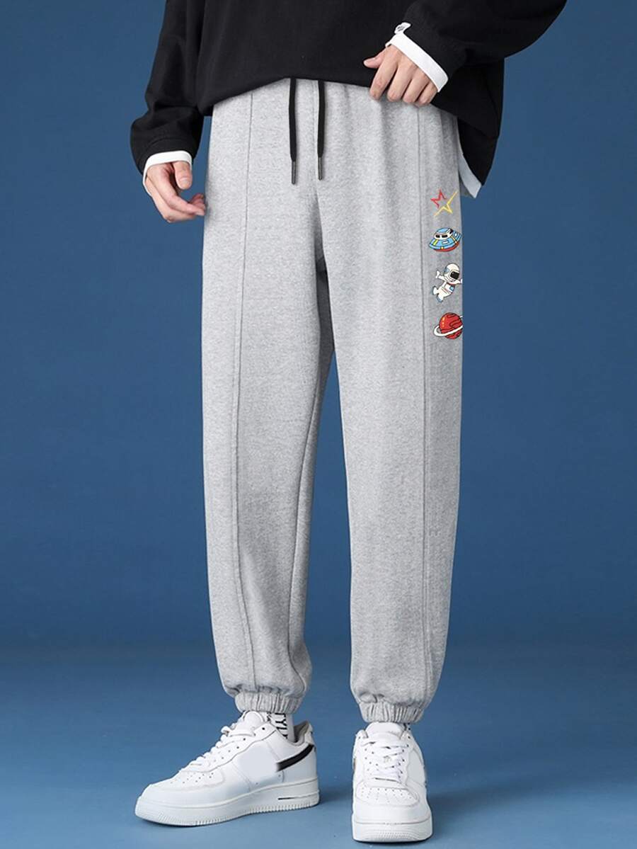 Manfinity Men Spaceman & Planet Print Seam Detail Drawstring Joggers - Grey - View 1