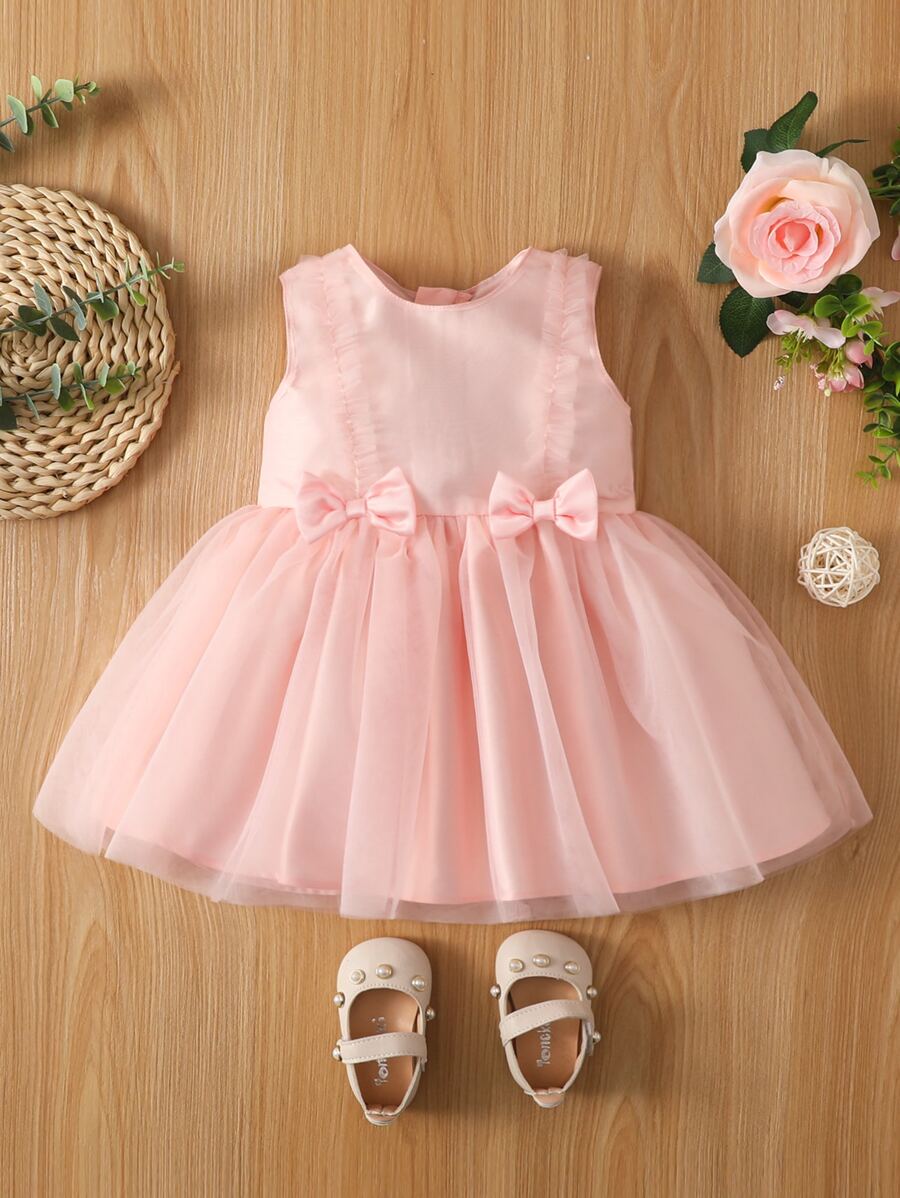 Đầm em bé Nơ Bướm Tương phản Mesh viền lá sen màu trơn Dễ thương - Màu Hồng baby - Xem 1