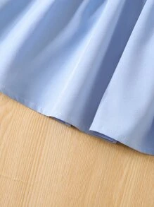 小女童荷葉邊打褶花邊下擺上衣和腰帶半身裙