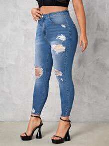SHEIN Essnce Jeans ajustados desgarro de talle alto