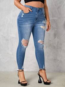 SHEIN Essnce Jeans ajustados desgarro de talle alto
