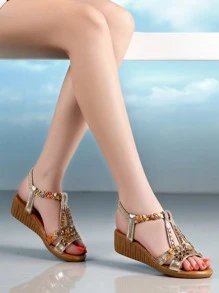 Sandali con zeppa metallizzato con strass