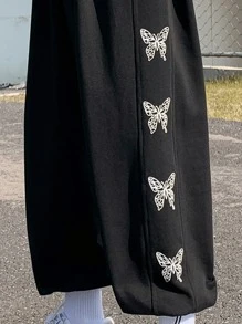 Manfinity Pantalones flojos de ajuste holgado para hombre con estampado de mariposas y dobladillo con cordón - Negro - Ver 6