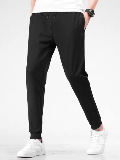 Men Drawstring Waist Tapered Pants