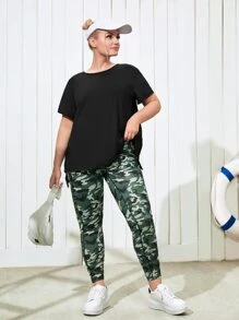 Easithlete Áo thun thể thao nữ dáng rộng có viền lưới không đối xứng - màu đen - Xem 3