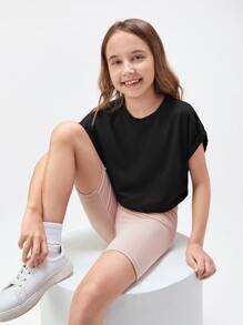 SHEIN Top court à col rond à manches courtes pour filles pré-adolescentes en couleur unie avec revers roulés