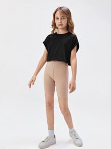 SHEIN Top court à col rond à manches courtes pour filles pré-adolescentes en couleur unie avec revers roulés
