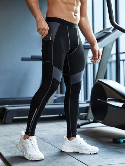 Manfinity Fitness Mallas deportivas estilo novio con bolsillo para teléfono, con gráfico de letras y costuras de adorno