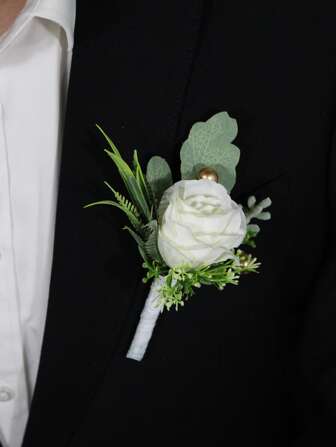 玫瑰和樹葉裝飾胸花