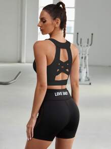 Easithlete Hỗ trợ trung bình Áo ngực thể thao Criss Cross Cut Out Back - màu đen - Xem 1