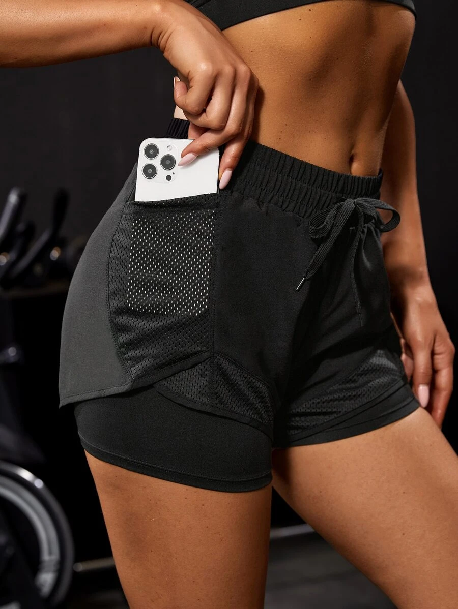 Powerista Shorts deportivos con cordón en la cintura y bolsillo para teléfono, shorts con cordón, shorts de sudadera para mujer, shorts de gimnasio, shorts de ciclista - Negro - Ver 1