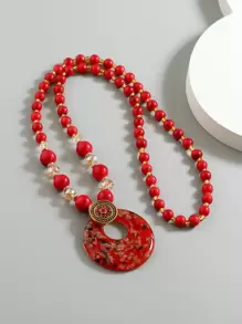 Collana di perline ciondolo rotondo