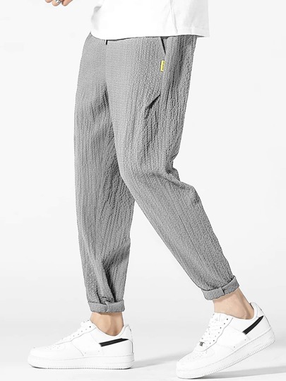 Men Letter Patched Detail Textured Tapered Pants