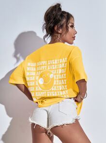 SHEIN Unity Camisetas gráficas con eslogan y estampa de rostro de dibujos animados para mujeres - Amarillo - Ver 1