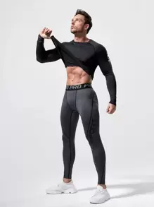 Manfinity Sport Corelite 男友风男士反光字母图案明线运动紧身裤