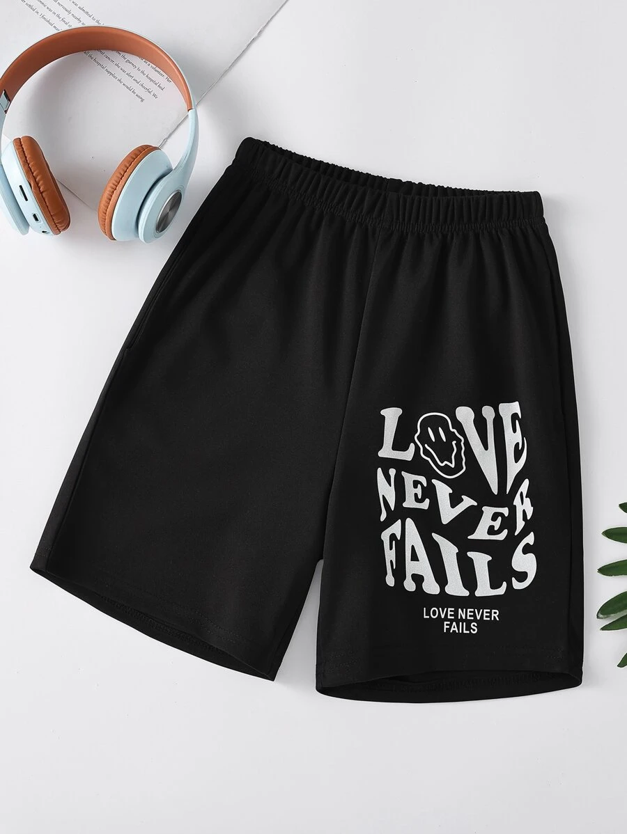 SHEIN Girls Cartoon And Letter Graphic Shorts - Black - View 1