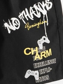 SHEIN 男孩卡通和字母圖案短褲