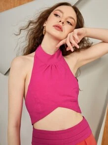 LALA BELTRÁN Designerski dwukolorowy kombinezon typu halter z wycięciami i plisowanymi detalami, z odkrytymi plecami