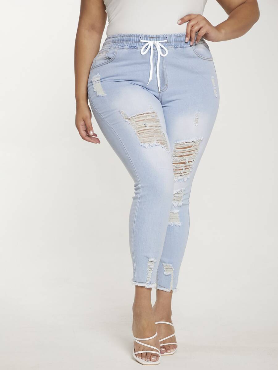 SHEIN Essnce Hơn Eo dây rút Rách Cắt Thô Quần jean ôm - Rửa nhẹ - Xem 1