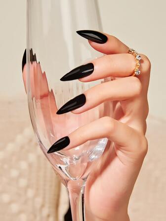 Actualice instantáneamente su aspecto con un conjunto de 24 piezas de uñas postizas con acabado negro sólido y brillante de tipo estilete extra largo, 1 lima de uñas y 1 hoja de suministros de uñas con cinta adhesiva