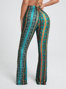 SHEIN SXY Pantalones acampanados con estampado floral con paisley con nudo delantero