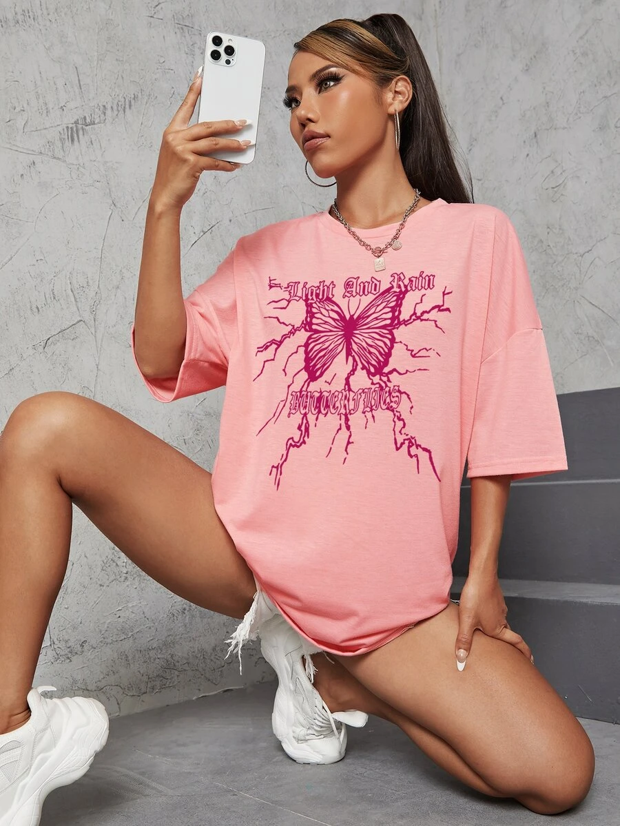 SHEIN Unity Camiseta amplia con estampado de slogan y mariposa de hombros caídos - Rosa - Ver 1